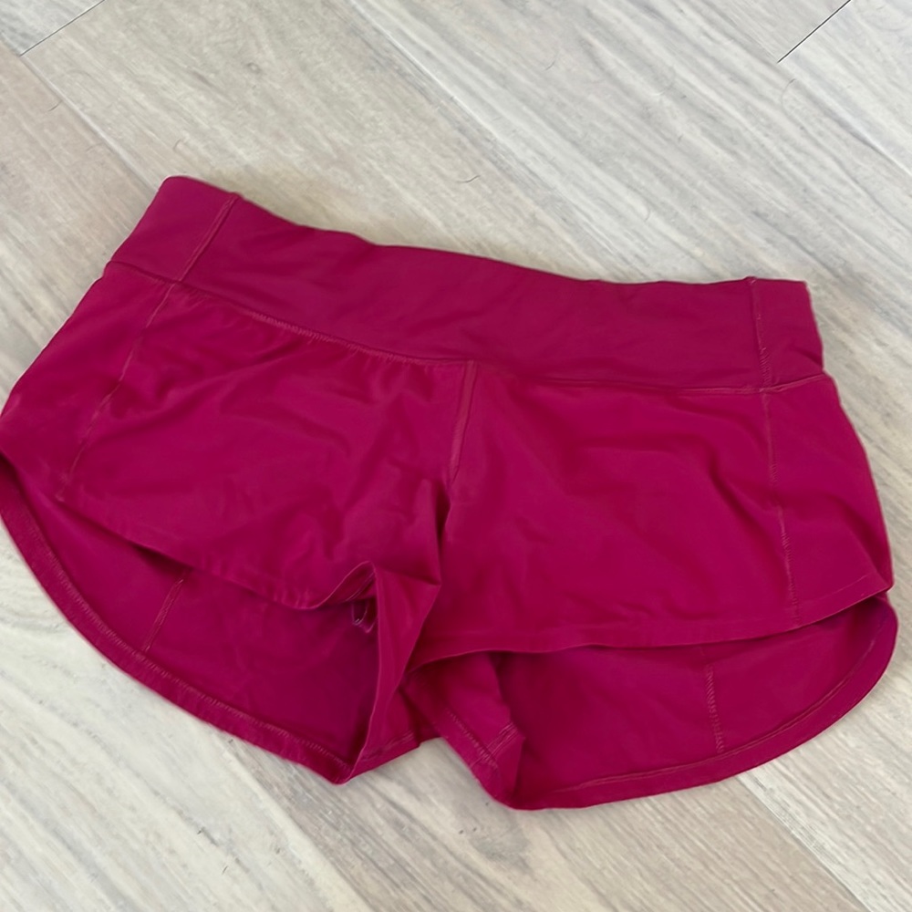 red Lululemon shorts